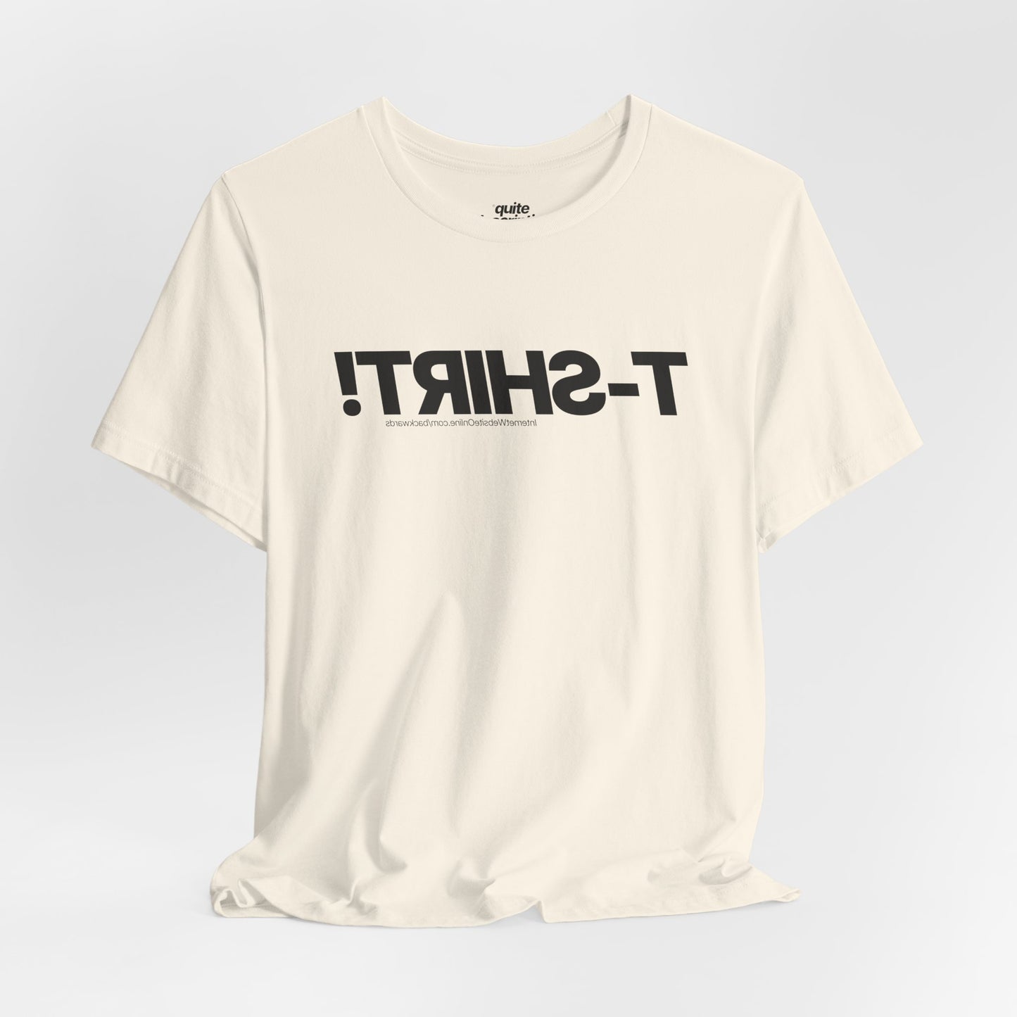 Quite Descriptive T-Shirt, only backwards! Bold Text Basic Graphic Tee.