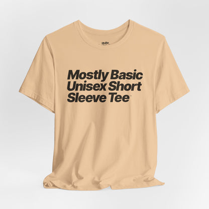 Quite Descriptive, Mostly Basic Unisex Short Sleeve Tee. Bold Italic Text Graphic Shirt.