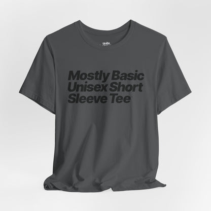 Quite Descriptive, Mostly Basic Unisex Short Sleeve Tee. Bold Italic Text Graphic Shirt.