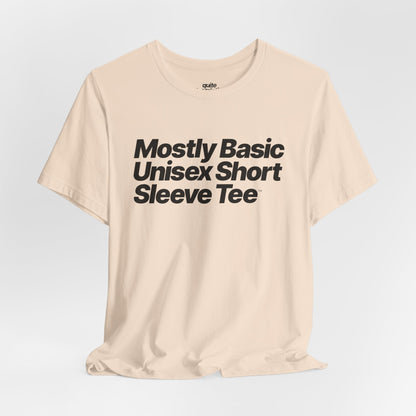 Quite Descriptive, Mostly Basic Unisex Short Sleeve Tee. Bold Italic Text Graphic Shirt.