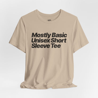Quite Descriptive, Mostly Basic Unisex Short Sleeve Tee. Bold Italic Text Graphic Shirt.